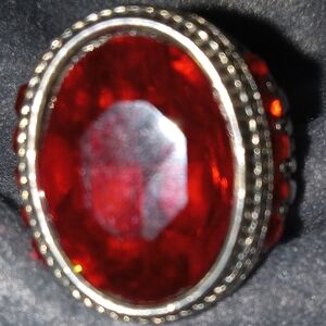 Get That Big Ruby look with this  Large Red glass And Silver plated costume ring